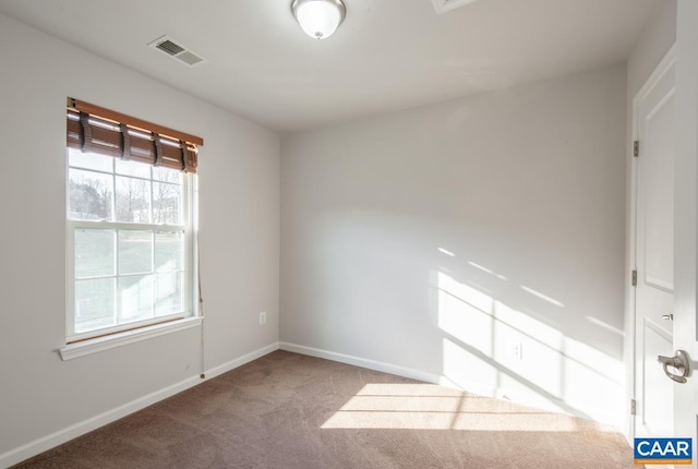 view of carpeted spare room