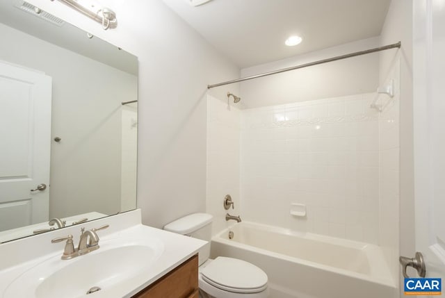 full bathroom featuring vanity, shower / washtub combination, and toilet