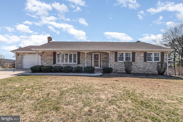 ranch-style house featuring brick siding, concrete driveway, a chimney, and a front lawn