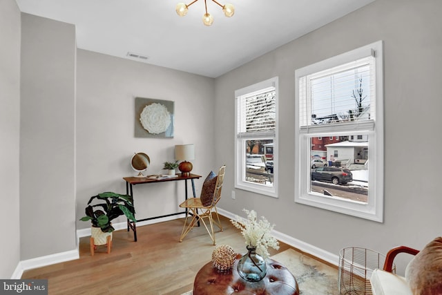 sitting room featuring hardwood / wood-style flooring