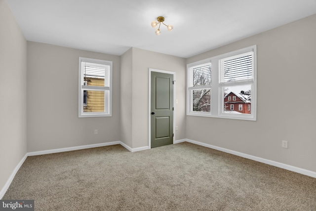 unfurnished bedroom featuring carpet floors