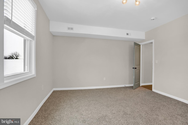 view of carpeted spare room