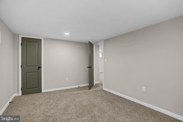 unfurnished room with carpet