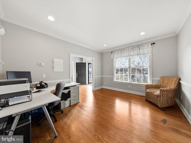 office space featuring recessed lighting, baseboards, light wood-style floors, and ornamental molding