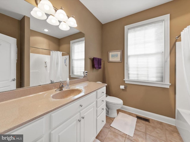 bathroom with visible vents, curtained shower, tile patterned flooring, baseboards, and vanity