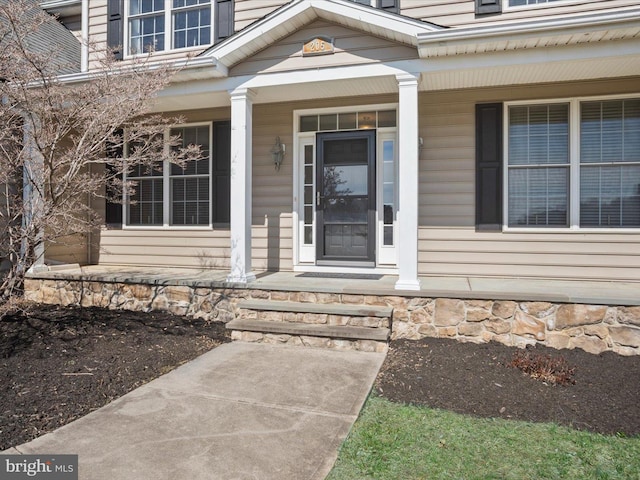 property entrance with a porch