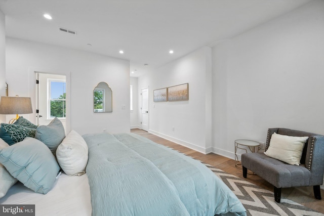 bedroom with light wood-type flooring