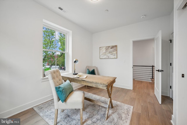 home office featuring light hardwood / wood-style flooring