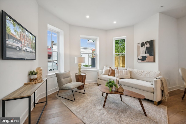 sitting room with light hardwood / wood-style floors