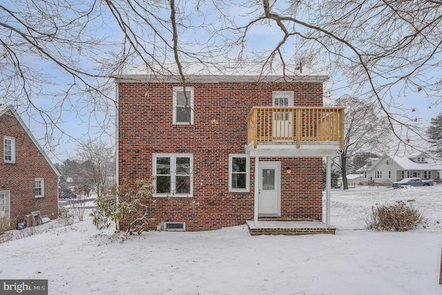 view of snow covered property