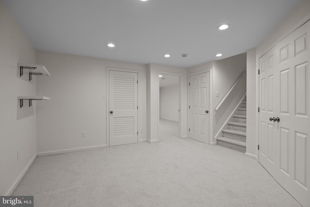 basement with light carpet