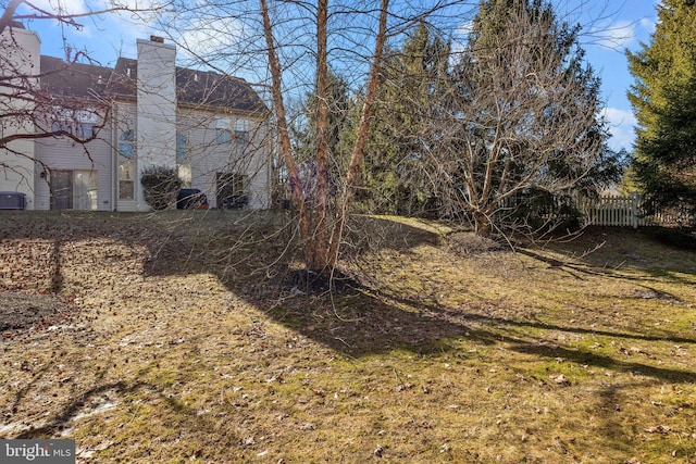 view of yard with central AC unit