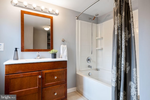 full bath featuring shower / bath combo with shower curtain, tile patterned flooring, vanity, and baseboards