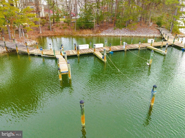 view of dock with a water view