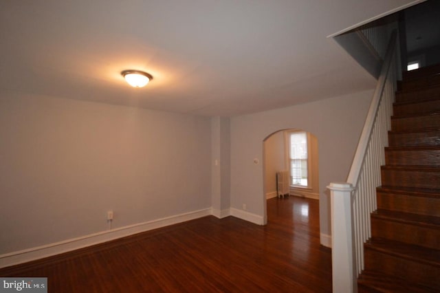 interior space with dark hardwood / wood-style floors