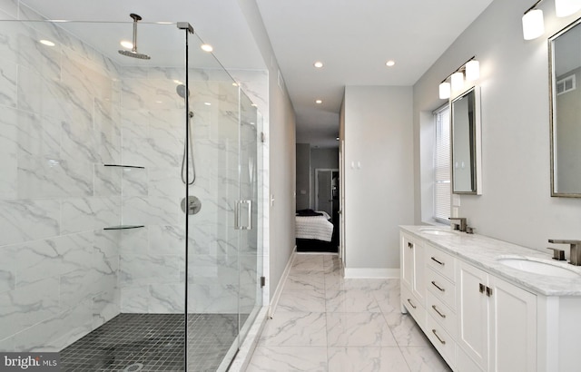 bathroom featuring walk in shower and vanity