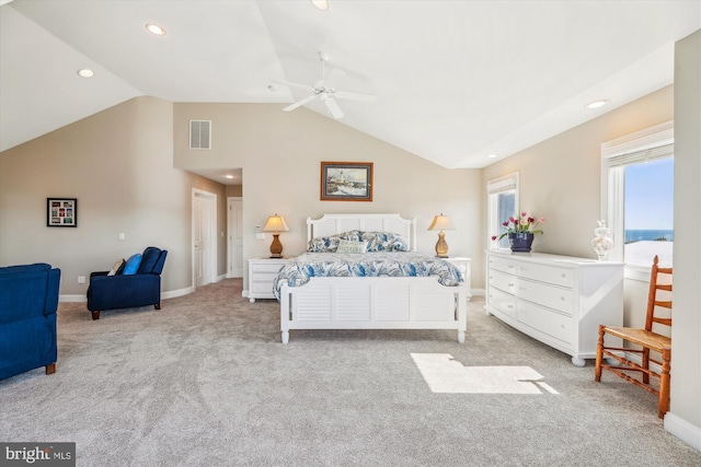 bedroom with lofted ceiling, carpet, visible vents, and baseboards