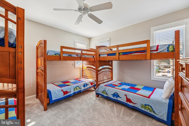 carpeted bedroom with baseboards