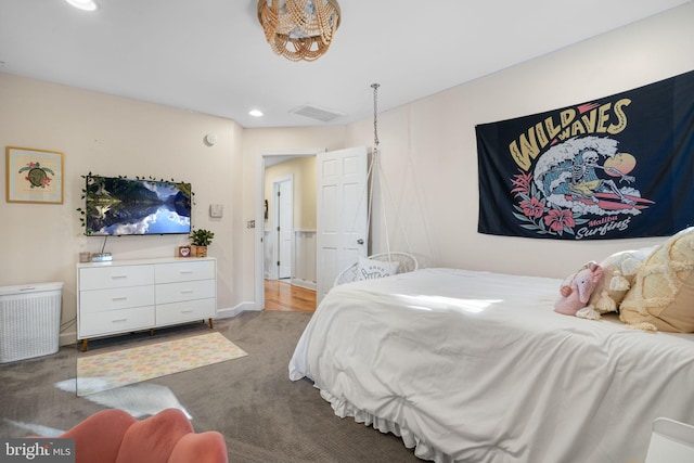 bedroom featuring baseboards, visible vents, and recessed lighting