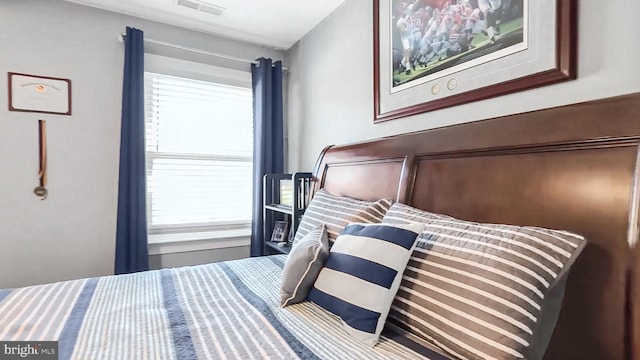 bedroom with visible vents