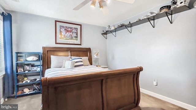 bedroom with carpet, ceiling fan, and baseboards