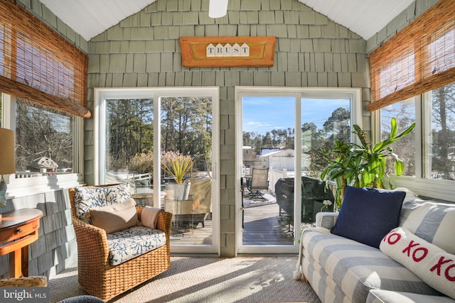 sunroom / solarium with vaulted ceiling