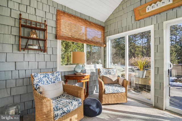 sunroom / solarium with vaulted ceiling