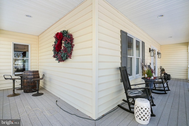 wooden deck with a porch