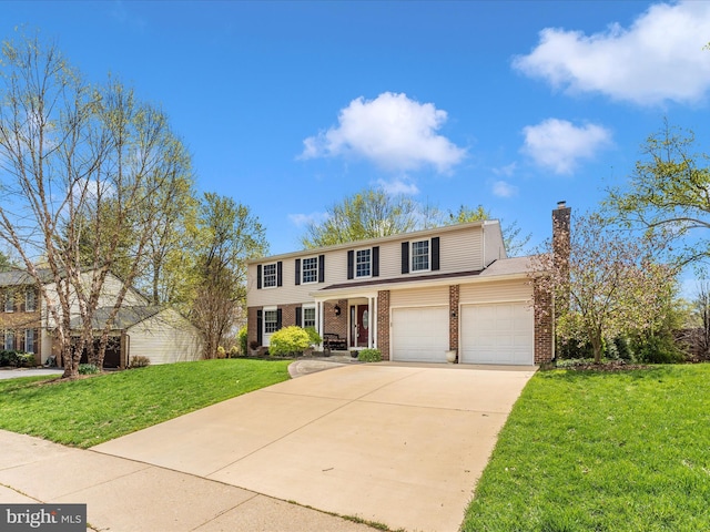 traditional-style home featuring a chimney, a front lawn, concrete driveway, an attached garage, and brick siding