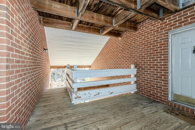 property entrance with brick siding