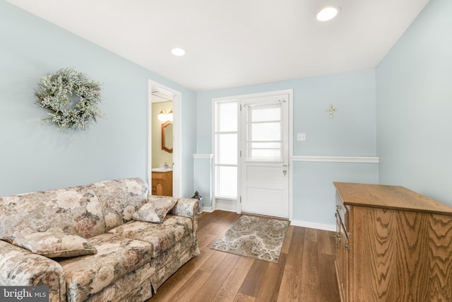 living room featuring dark wood-type flooring