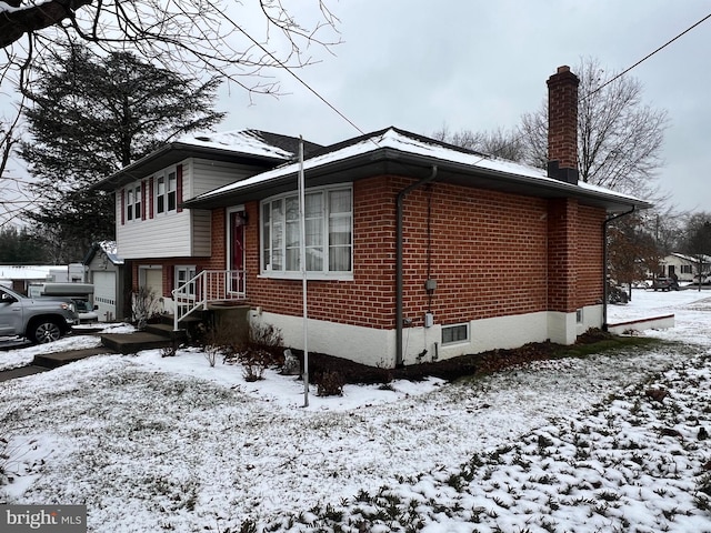 view of snow covered exterior