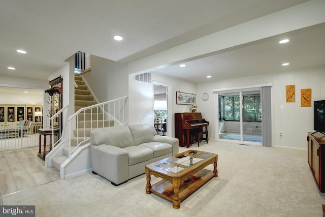 living room featuring light colored carpet