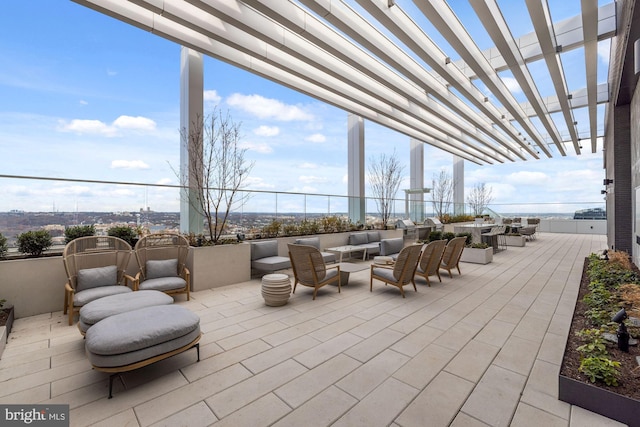 view of patio featuring an outdoor living space and a pergola