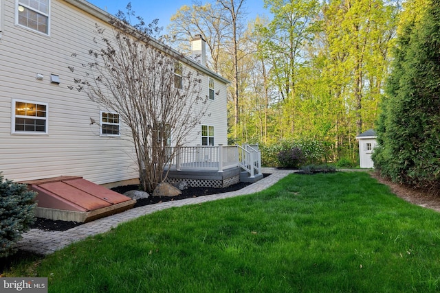 view of yard featuring a deck