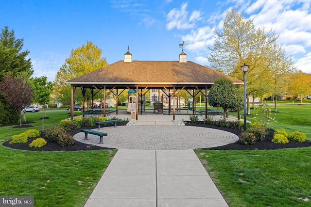 view of community with a lawn and a gazebo