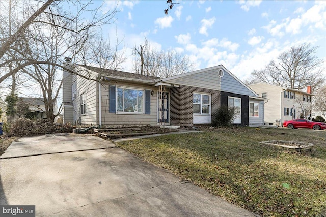 ranch-style house with a front yard