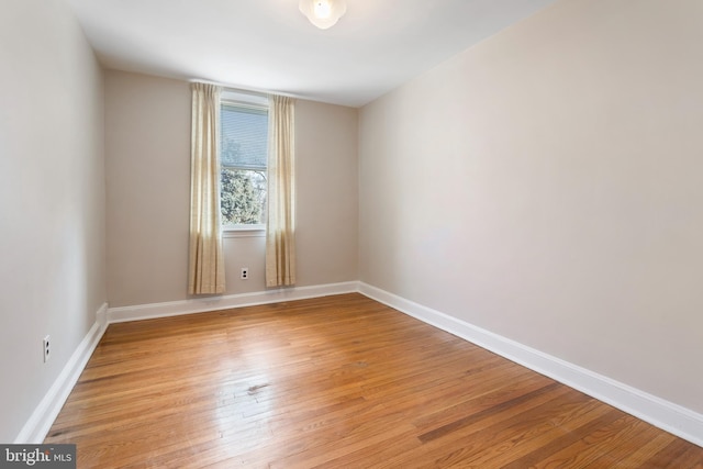 unfurnished room featuring light wood-type flooring