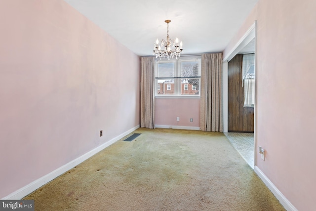 unfurnished dining area with light carpet and an inviting chandelier