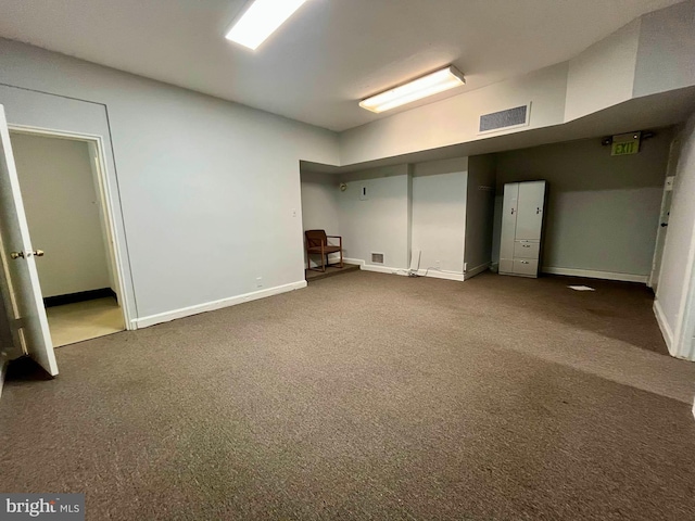 basement with dark carpet