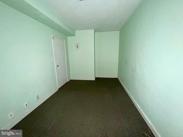 unfurnished room featuring carpet floors