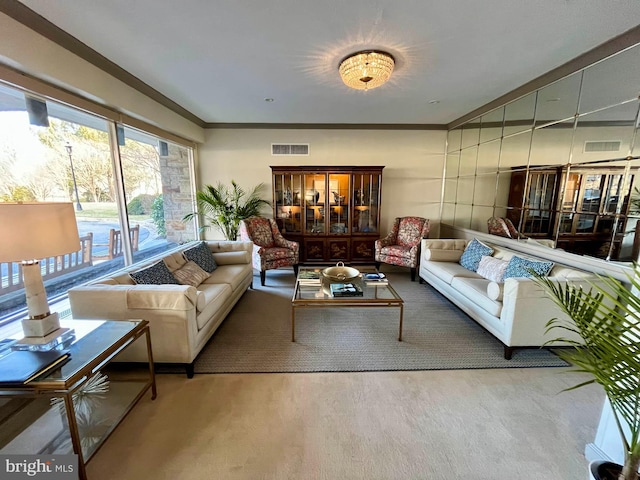 living room with ornamental molding