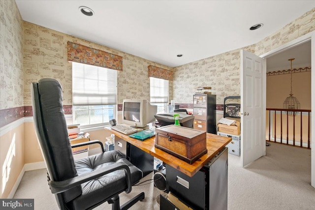 office area featuring light colored carpet