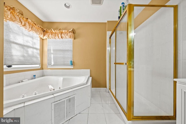 bathroom featuring shower with separate bathtub and tile patterned floors