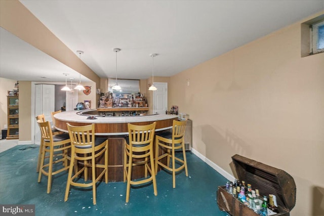 dining area featuring bar