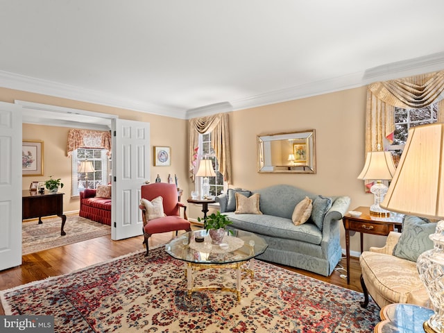 living room featuring hardwood / wood-style floors and ornamental molding