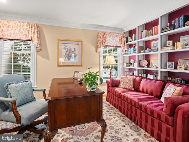 sitting room featuring ornamental molding