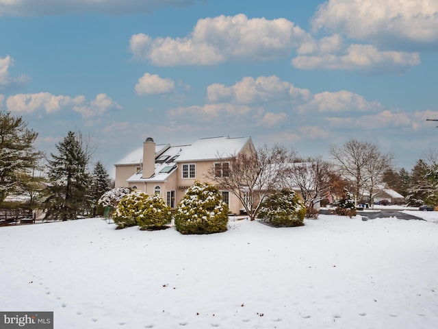 view of snow covered property