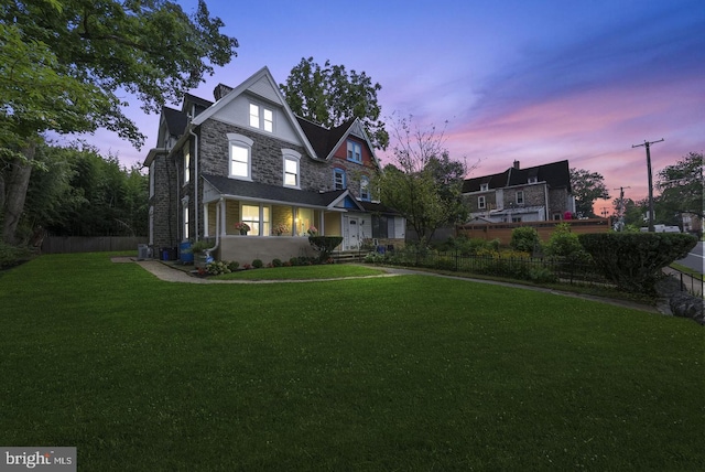 view of front of home featuring a yard