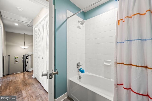 full bathroom with shower / bathtub combination with curtain and wood finished floors